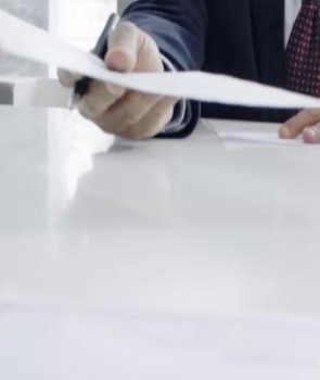 Hands holding a piece of paper